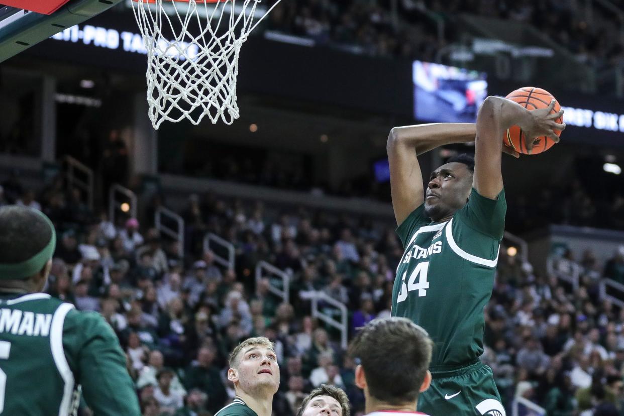 Michigan State forward Xavier Booker (34) goes to the basket against Southern Indiana during the second half at Breslin Center in East Lansing on Thursday, Nov. 9, 2023.