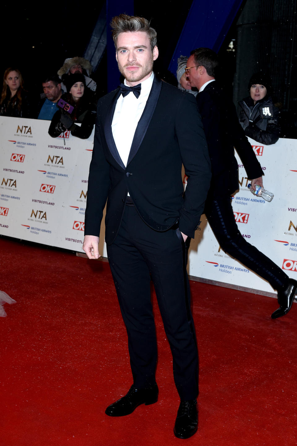 <p>Wearing a dapper tux. <em>[Photo: Getty]</em> </p>