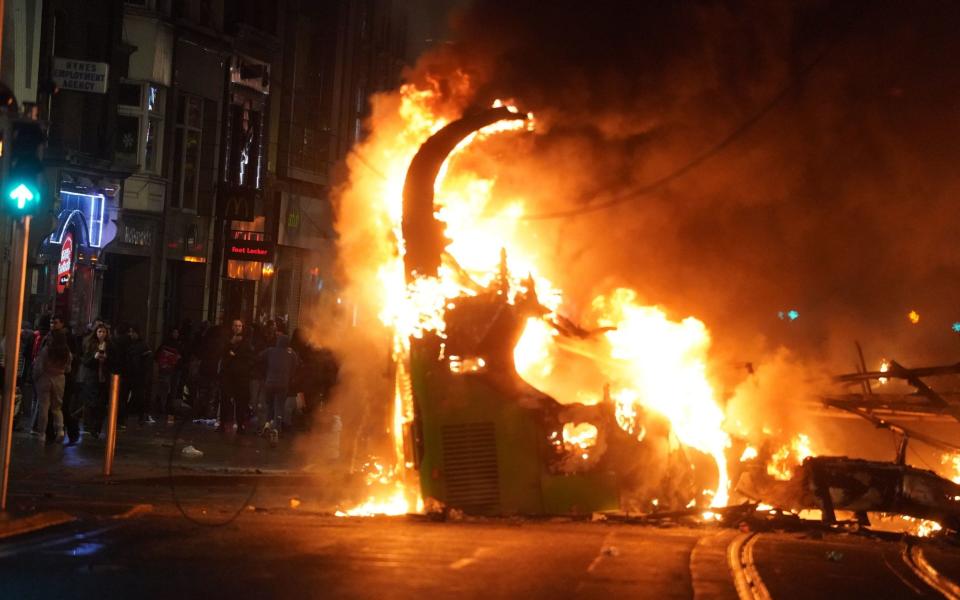 A bus on fire on O'Connell Street in Dublin city centre