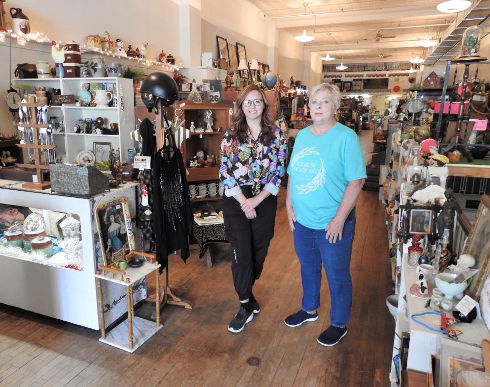 Manager Katie Williard and owner Pam Chaney stand inside the Coshocton Antique Mall. Chaney recently took ownership from Jean Darr. Since that time, they've doubled vendors and have tried to give the store a more open and brighter look. Both women said business has picked up and there's an energy among customers and vendors.