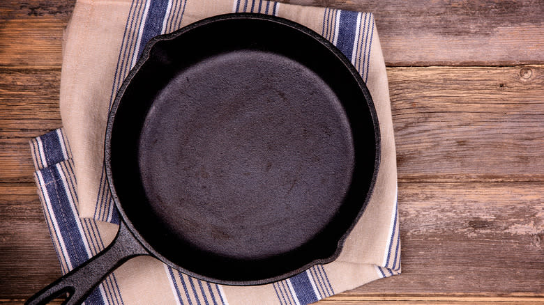 Cast iron skillet on towel