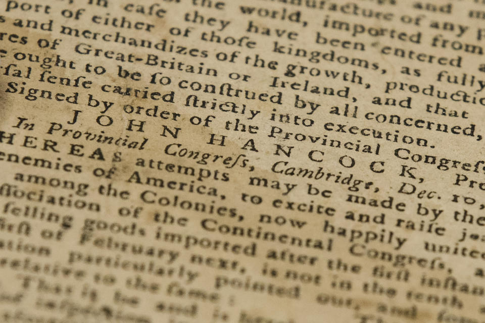 This Thursday, Oct. 25, 2018 photo shows John Hancock's name in a Dec. 28, 1774 Pennsylvania Journal and the Weekly Advertiser at the Goodwill Industries in Bellmawr, N.J. A quick eye by Goodwill workers in southern New Jersey turned up an original 1774 Philadelphia newspaper with an iconic "Unite or Die" masthead. (AP Photo/Matt Rourke)