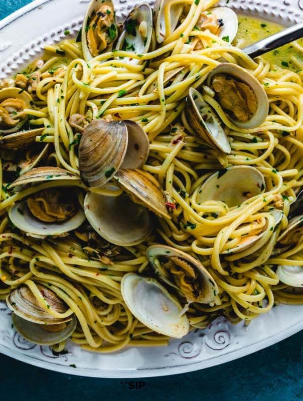 <p>Sip and Feast</p><p>Linguine alle vongole (linguine with clams) is such a great dish. It’s so fresh and vibrant from the delicious briny clams.</p><p><strong>Get the recipe: <a href="https://www.sipandfeast.com/linguine-alle-vongole/" rel="nofollow noopener" target="_blank" data-ylk="slk:Linguine alle Vongole;elm:context_link;itc:0;sec:content-canvas" class="link ">Linguine alle Vongole</a></strong></p>