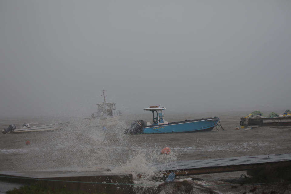 <p>Boats remain anchored in a wharf as Hurricane Maria approaches in Guadeloupe island, France, Sept. 18, 2017. (Photo: Andres Martinez Casares/Reuters) </p>