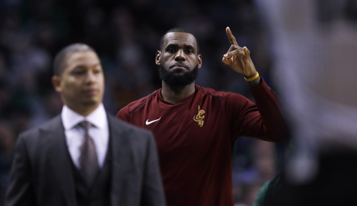 LeBron James and Tyronn Lue aren’t on the same page. (AP)