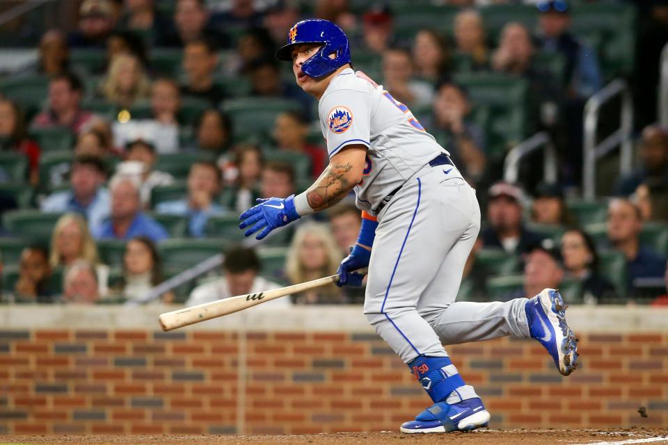 New York Mets designated hitter Francisco Alvarez grounds into a double play in his first career at-bat against the Atlanta Braves in the second inning at Truist Park.