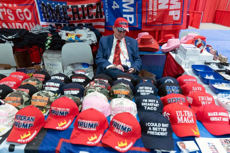 A booth selling hats is seen at the Conservative Political Action Conference, CPAC 2023, cheers during the session, at the National Harbor, in Oxon Hill, Md., Thursday, March 2, 2023. (AP Photo/Jose Luis Magana) (AP)