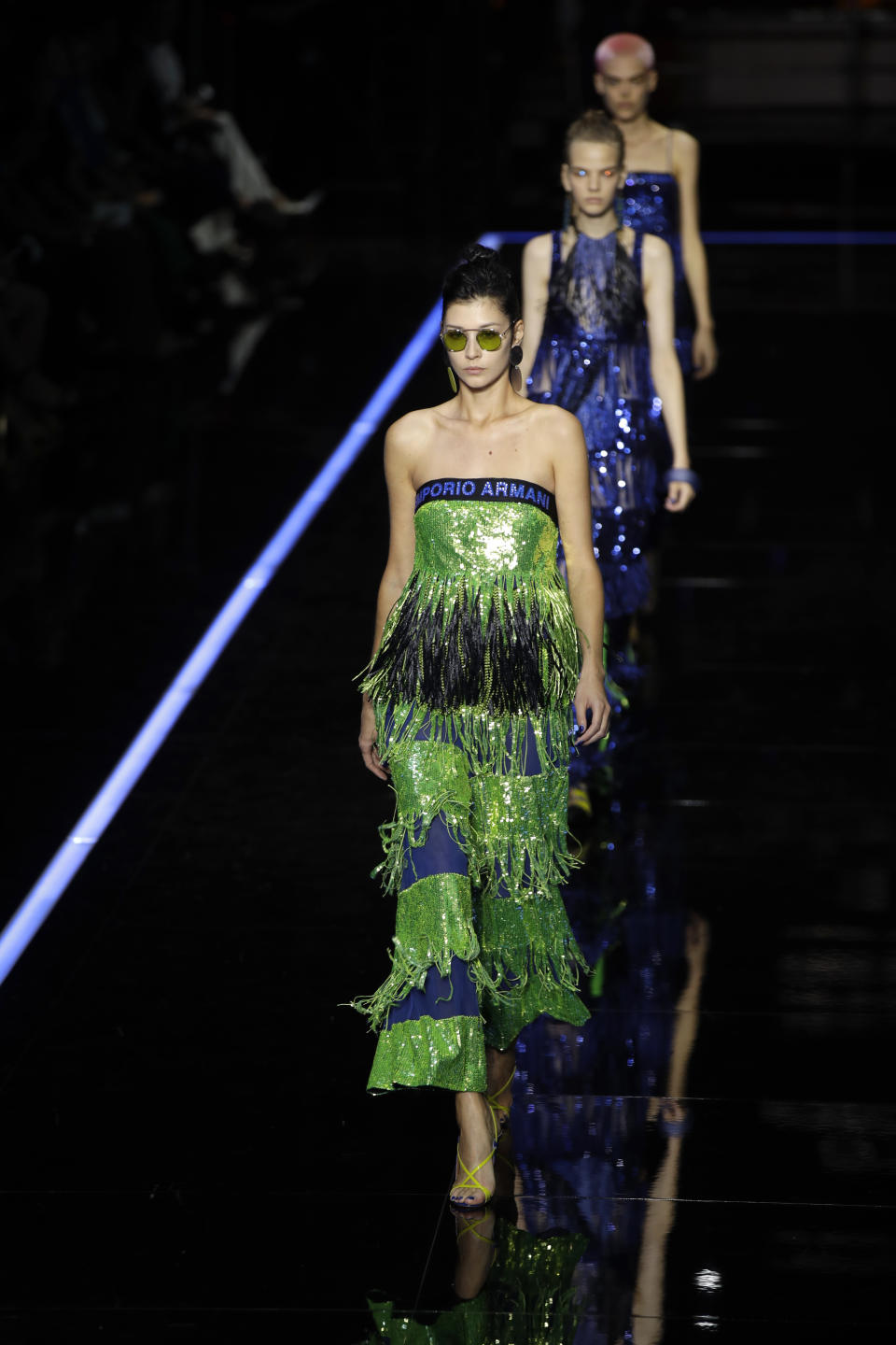 A model wears a creation as part of the Emporio Armani women's 2019 Spring-Summer collection, unveiled during the Fashion Week in Milan, Italy, Thursday, Sept. 20, 2018. (AP Photo/Luca Bruno)