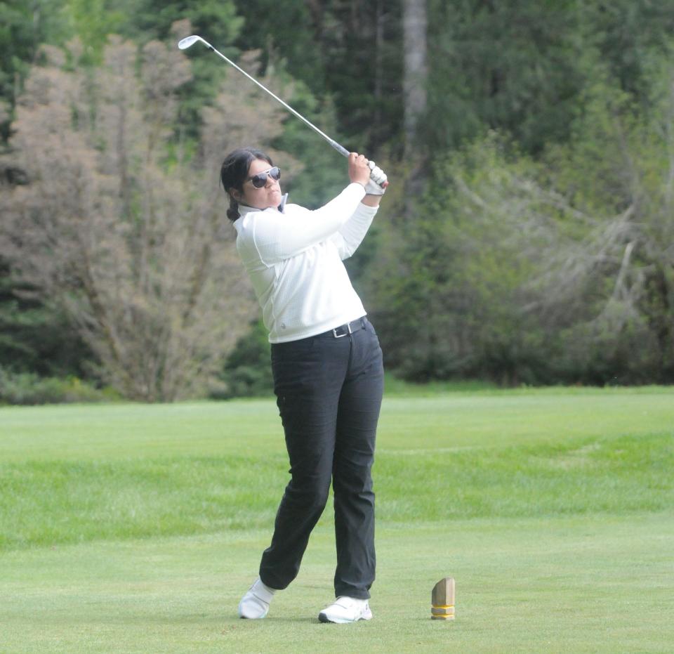 Thurston's Olivia Grandberry tees off during the 5A Midwestern League District Championships Wednesday, May 1, 2024, at Tokatee Golf Club in McKenzie Bridge, Ore.