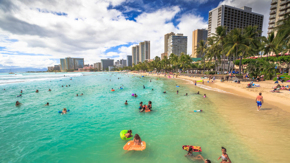 Waikiki, Oahu, Hawaii, United States - August 27, 2016: Prince Kuhio Beach also called The Ponds, because bounded by concrete walls that have created a calm water swimming pool.