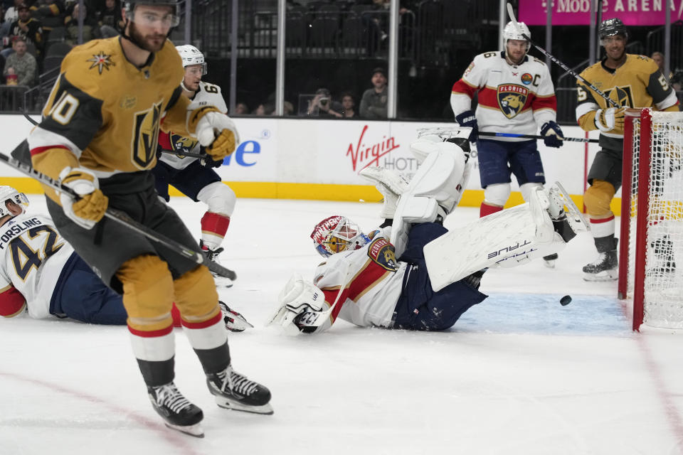 Vegas Golden Knights center Nicolas Roy (10) scores on Florida Panthers goaltender Sergei Bobrovsky (72) during the second period of an NHL hockey game Thursday, Jan. 12, 2023, in Las Vegas. (AP Photo/John Locher)