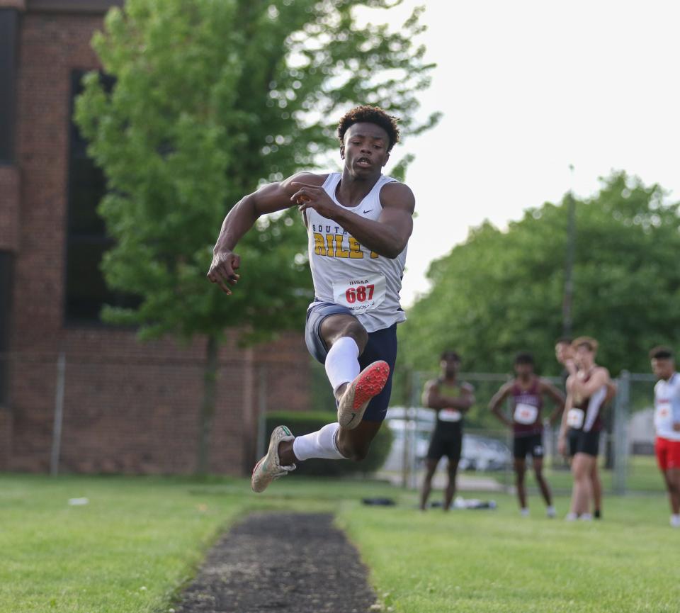 Robert Nabieu of South Bend Riley competes in the finals of the Long Jump Thursday, May 26, 2022 during the Boys Track & Field Regional at Goshen High School.