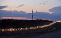 Traffic lines the highway as residents leave Fort McMurray, Alta., on Tuesday May 3, 2016. THE CANADIAN PRESS/Jason Franson