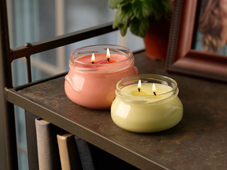 After work, put your laptop away and light your favorite candle to create a soothing ambience.  (Photo: HighImpactPhotography via Getty Images)