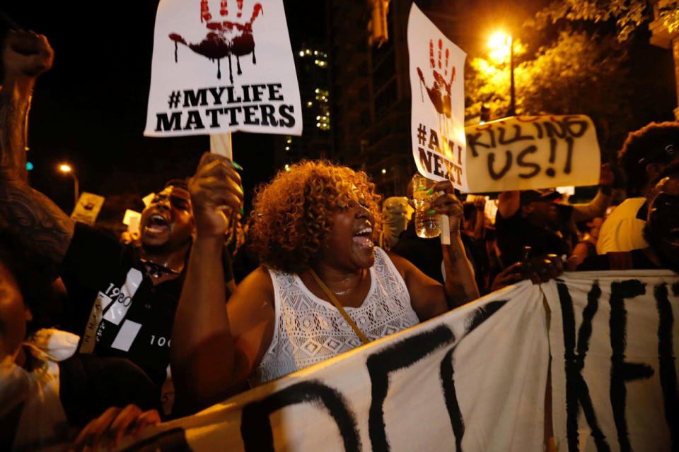 <p>A woman yells during a protest against the police shooting of Keith Scott in Charlotte, North Carolina, U.S., September 23, 2016. (Jason Miczek/Reuters)</p>