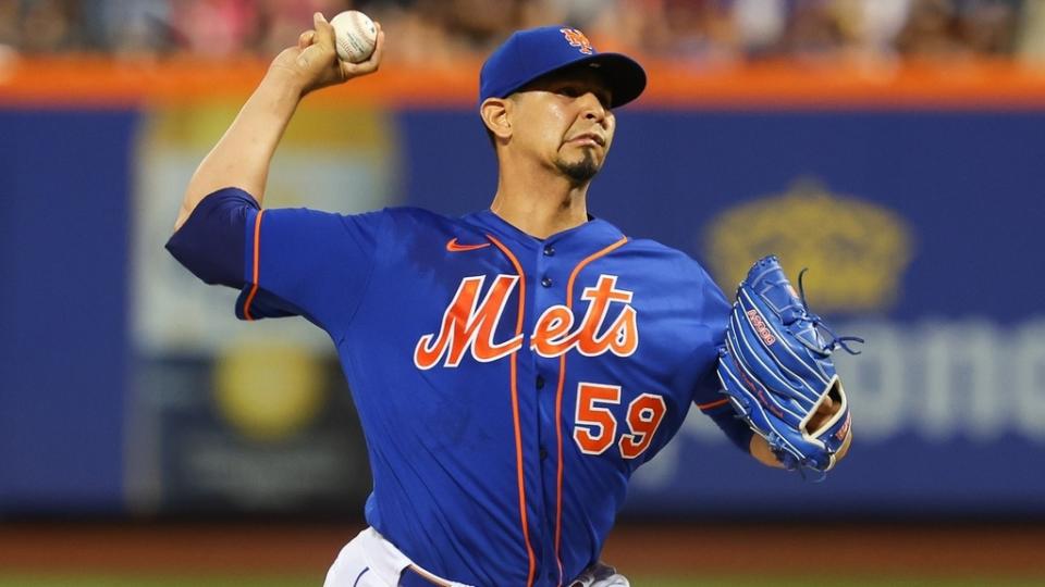 Jul 29, 2023; New York City, New York, USA; New York Mets starting pitcher Carlos Carrasco (59) delivers a pitch during the first inning against the Washington Nationals at Citi Field.