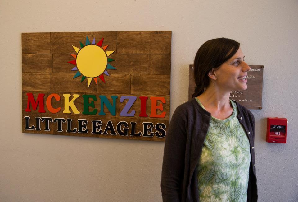 Jessica Marie, director of Little Eagles Childcare Center, welcomes visitors to an open house in Blue River. 