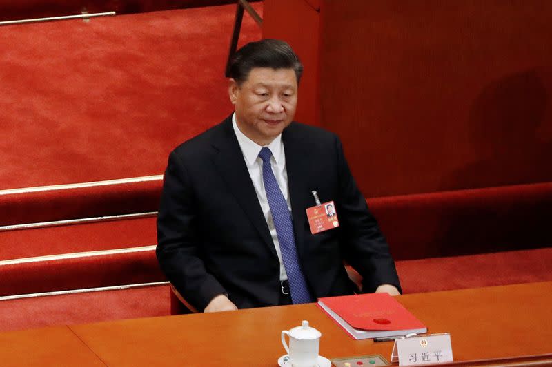 FILE PHOTO: Chinese President Xi Jinping attends the closing session of NPC in Beijing