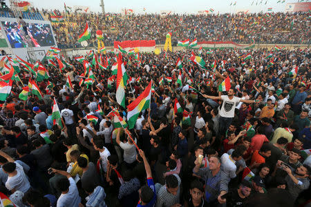 Kurdish people attend a rally to show their support for the upcoming September 25th independence referendum in Duhuk, Iraq September 16, 2017. REUTERS/Ari Jalal