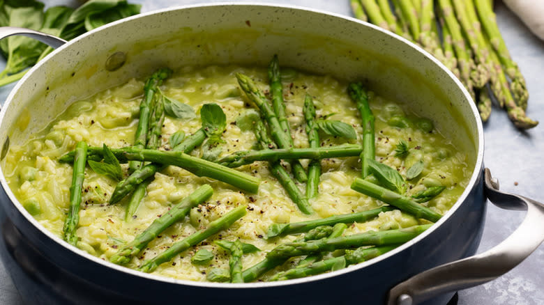 Asparagus risotto in large pan