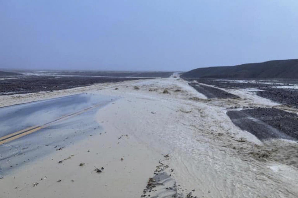 In this photo provided by the National Park Service, Highway 190 is closed due to flash flooding in Death Valley National Park, Calif., Friday, Aug. 5, 2022. Heavy rainfall triggered flash flooding that closed several roads in Death Valley National Park on Friday near the California-Nevada line. The National Weather Service reported that all park roads had been closed after 1 to 2 inches of rain fell in a short amount of time. (National Park Service via AP)