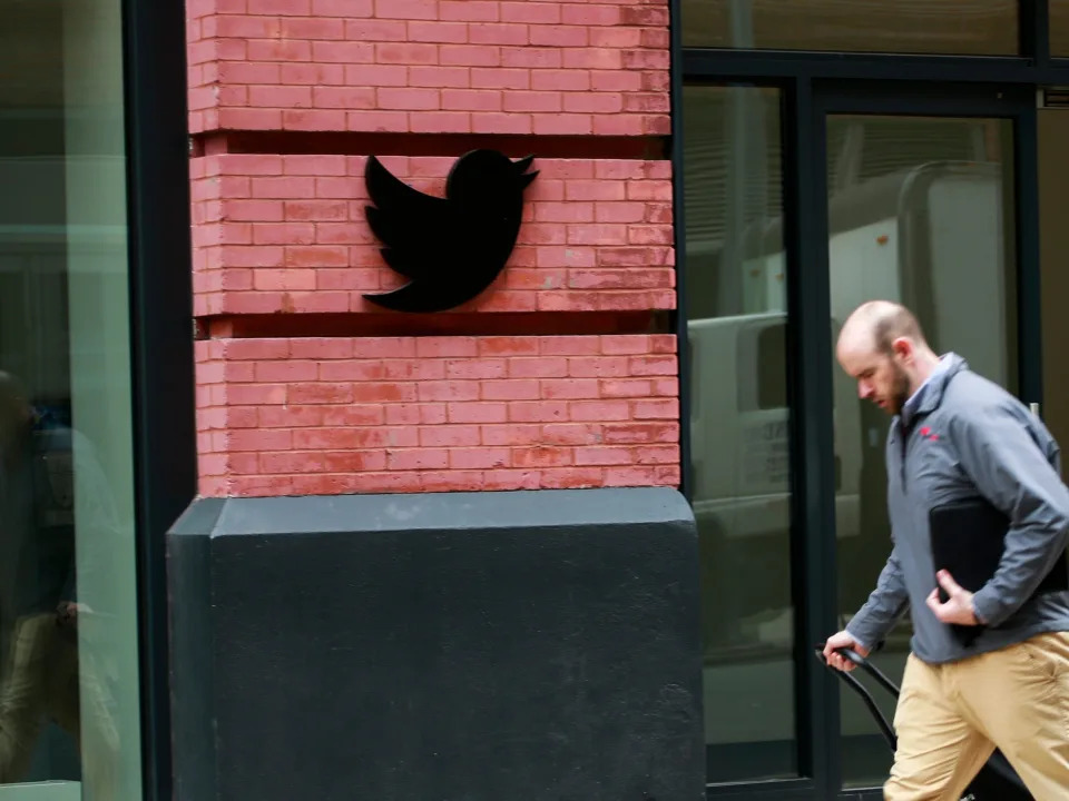 Man walks by the Twitter office on April 26, 2022 in New York City.