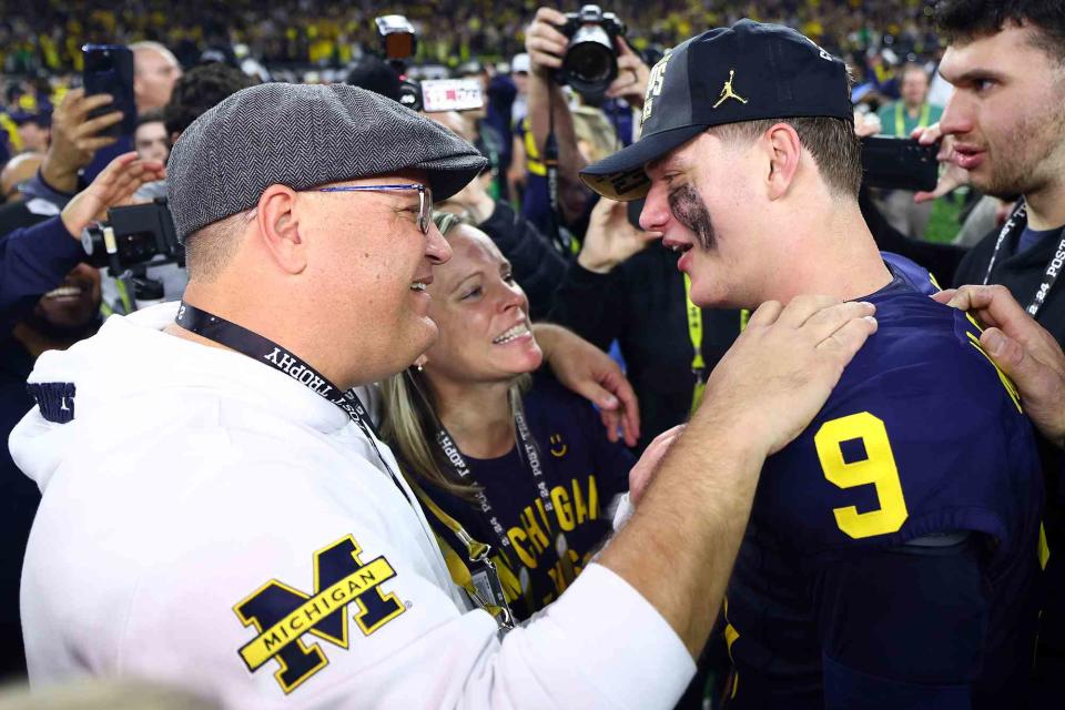 <p>Maddie Meyer/Getty</p> J.J. McCarthy celebrates with his family after 2024 CFP National Championship on January 08, 2024 in Houston, Texas.