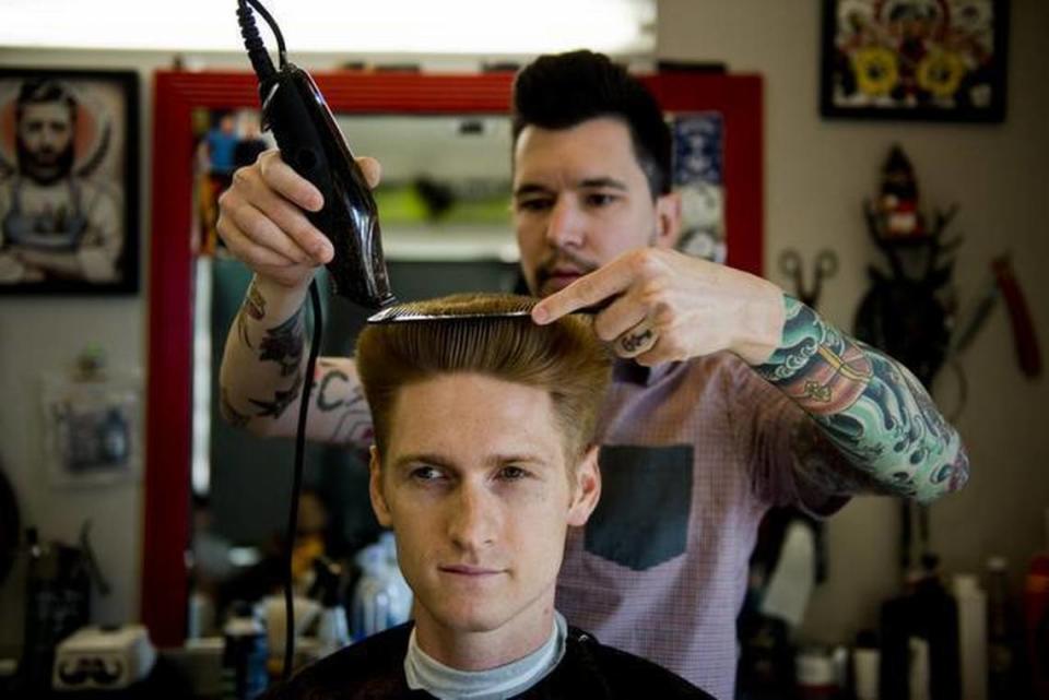 Anthony Giannotti cuts Brian Pattenaude’s hair five months ago at Anthony’s Barbershop. Giannotti is partnering with bartender Jayson Wilde to help launch Bottle & Barlow, where patrons can get haircuts and enjoy an alcoholic drink.