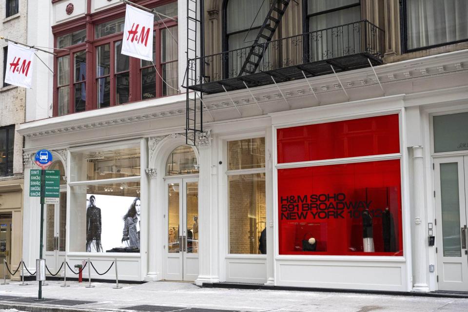 a store front with a flag