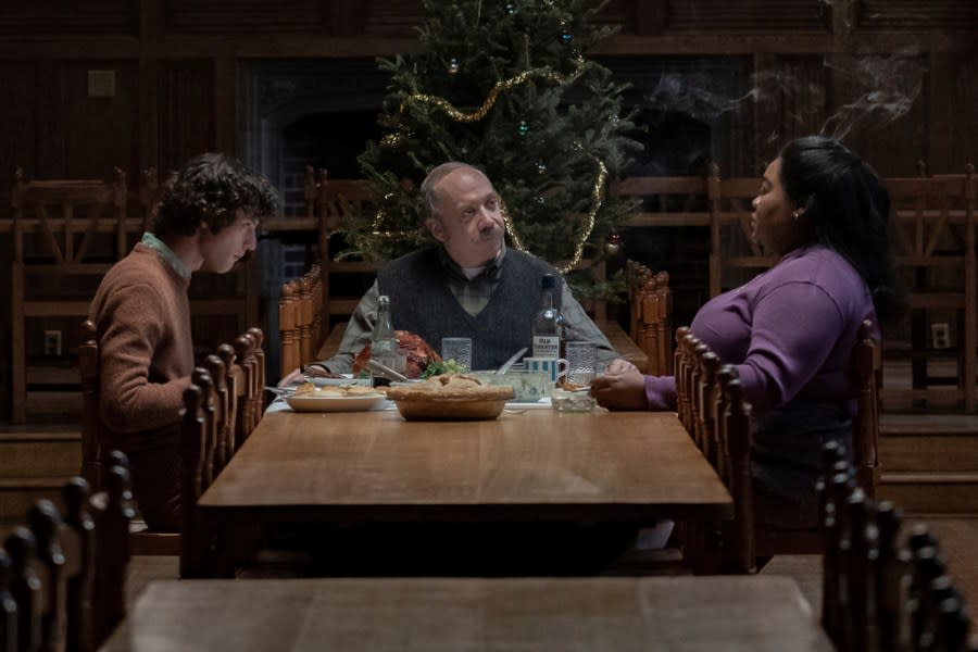This image released by Focus Features shows Dominic Sessa, from left, Paul Giamatti and Da’Vine Joy Randolph in a scene from “The Holdovers.” (Seacia Pavao/Focus Features via AP)