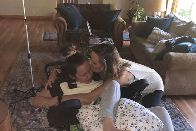 <p>Courtesy of Sarah Rasby </p> Sarah hugs Erin 11 months after her cardiac event, in 2019 in Blair, Nebraska.