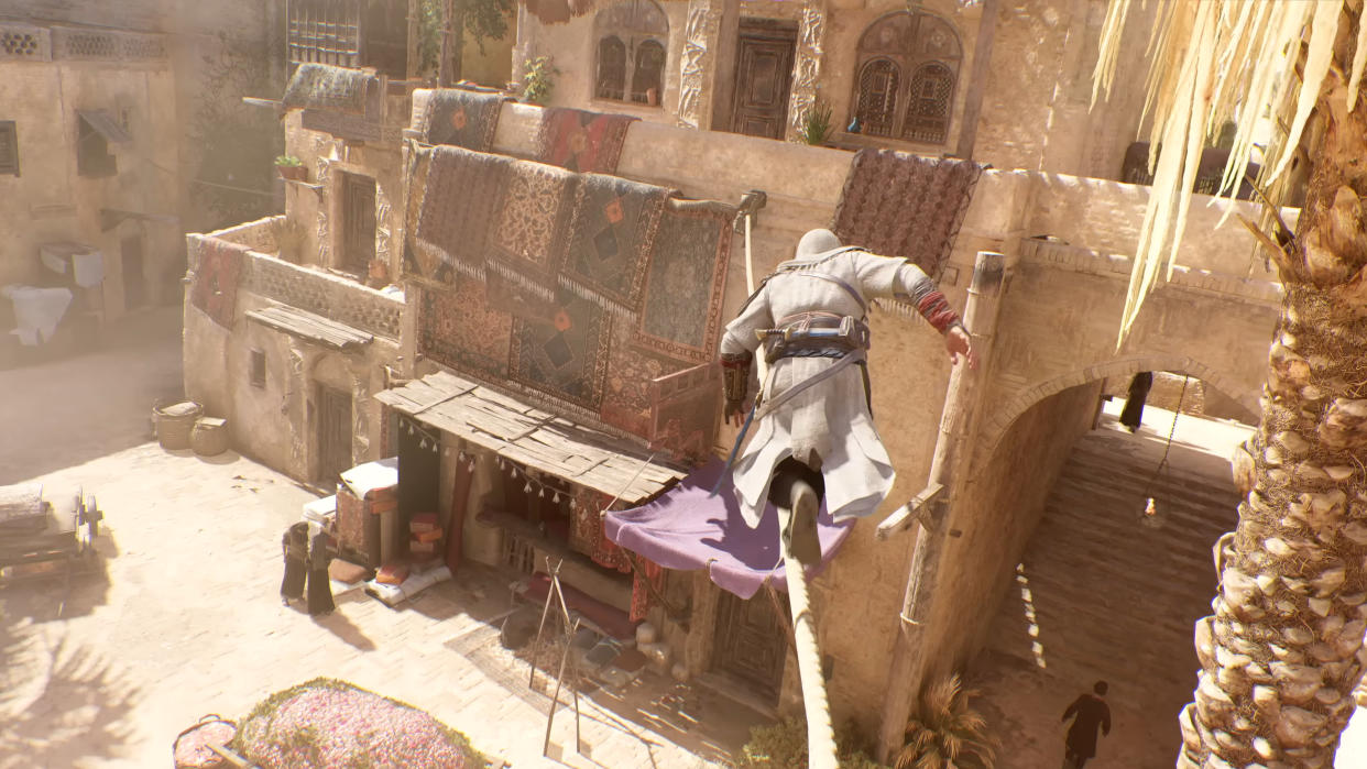  Basim walking on a rope between two buildings in Assassin's Creed Mirage 