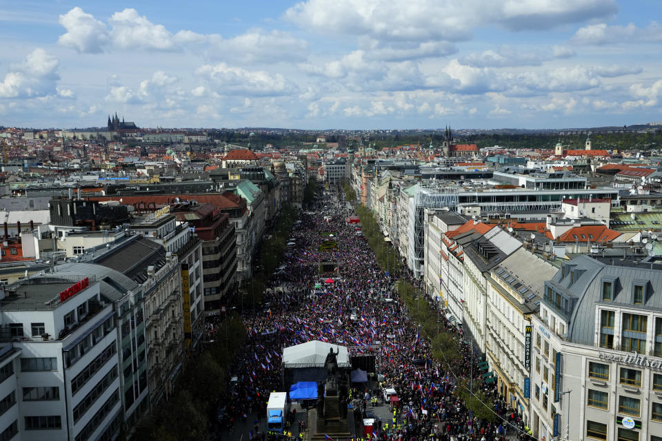 Thousands of people gathers to protest high inflation and to demand the government's resignation in Prague, Czech Republic, Sunday, April 16, 2023. (AP Photo/Petr David Josek)