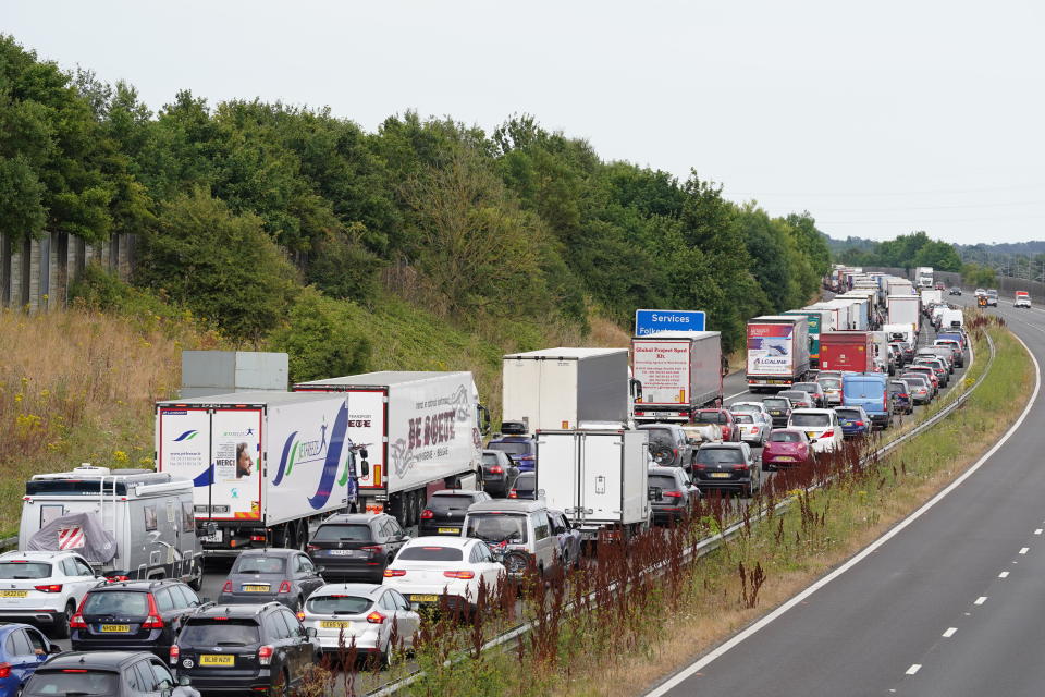 Traffic queuing on the M20 near Folkestone in Kent, as families embark on getaways at the start of summer holidays for many schools in England and Wales. Picture date: Friday July 22, 2022.