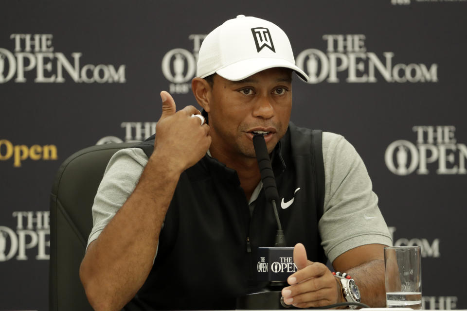 FILE - In this July 16, 2019, file photo, Tiger Woods speaks at a press conference ahead of the start of the British Open golf championships at Royal Portrush in Northern Ireland. Woods responded to the protests and some of the violence around the country by saying points can be made without destroying property. (AP Photo/Matt Dunham, File)