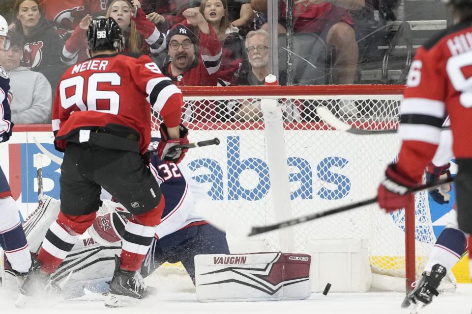 New Jersey Devils right wing Timo Meier (96) scores a goal against the Columbus Blue Jackets during the third period of an NHL hockey game, Thursday, April 6, 2023, in Newark, N.J. The Devils won 8-1. (AP Photo/Mary Altaffer)