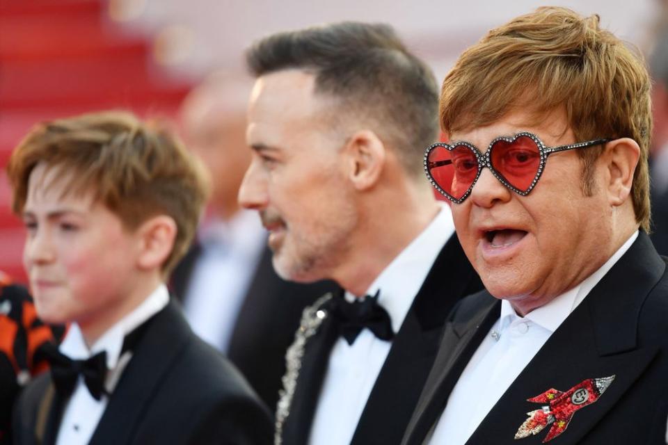 David Furnish and Elton John | ALBERTO PIZZOLI/AFP/Getty