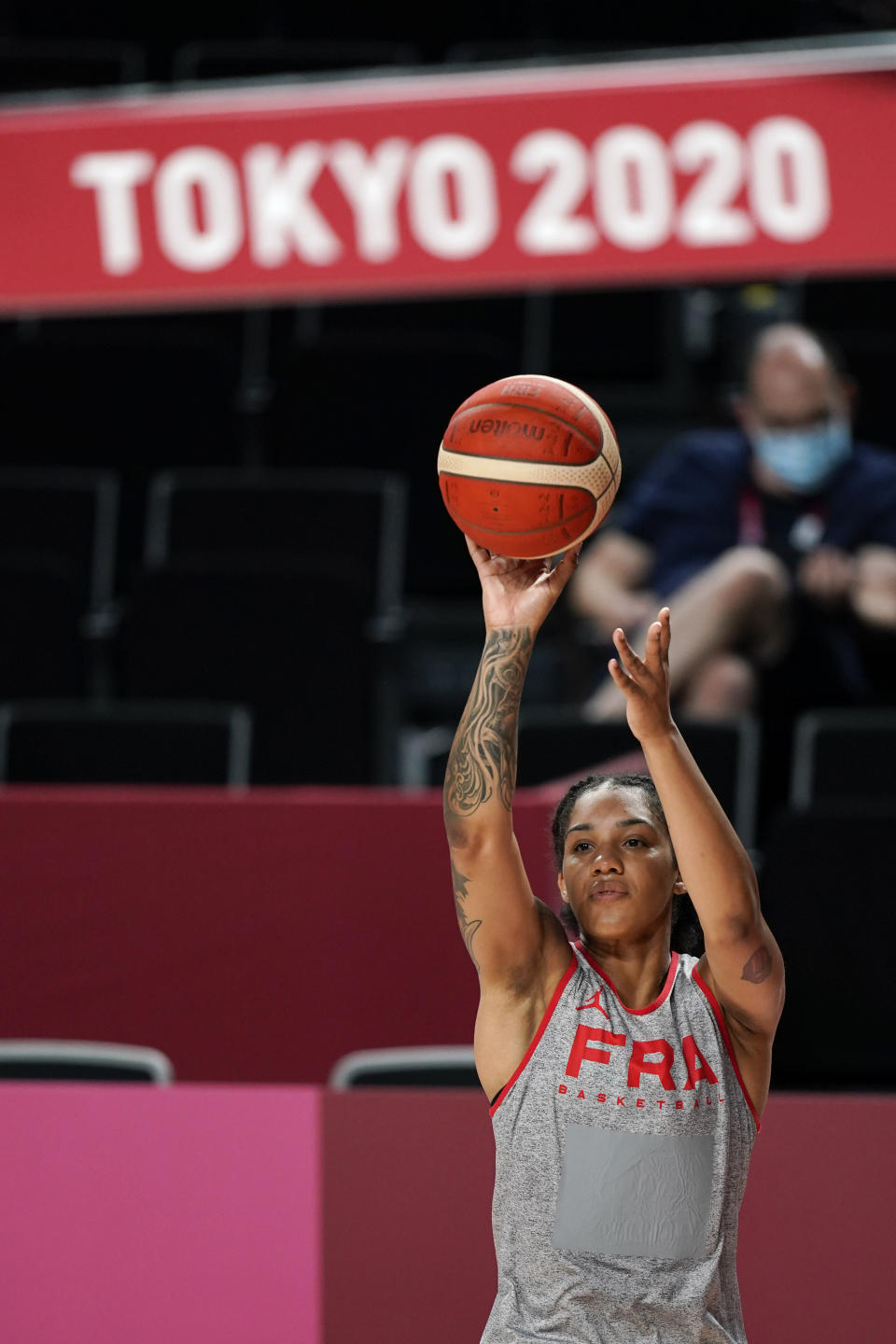 France's Gabby Williams shoots during a women's basketball practice at the 2020 Summer Olympics, Saturday, July 24, 2021, in Saitama, Japan. (AP Photo/Charlie Neibergall)