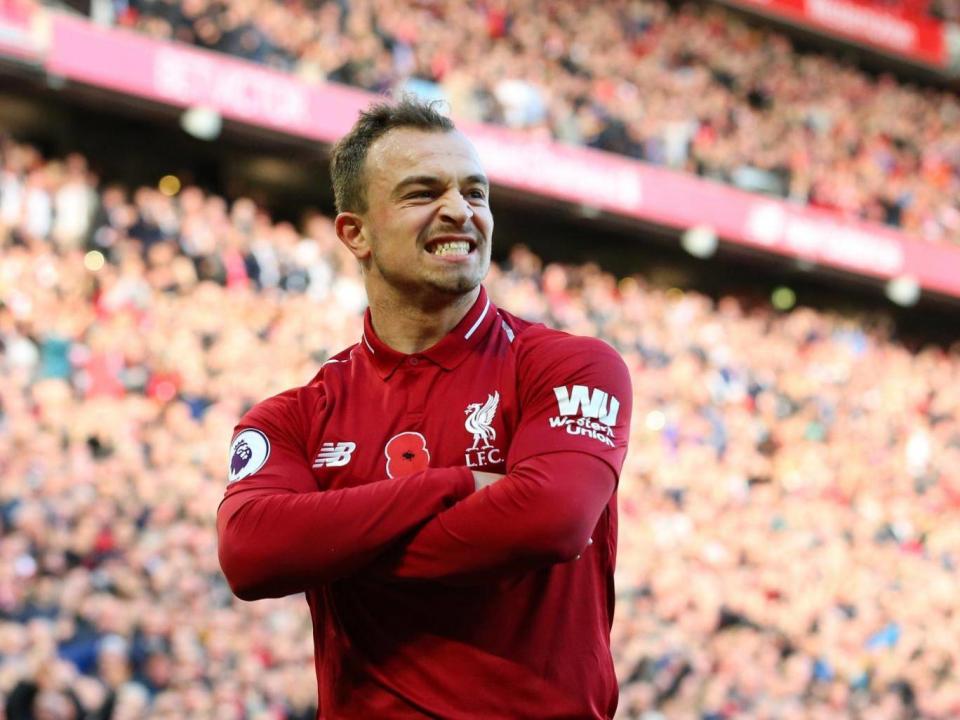 Xherdan Shaqiri celebrates after securing Liverpool's victory over Fulham (Getty)