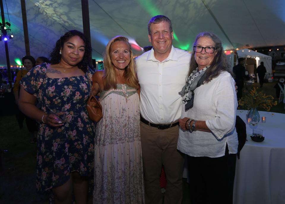 In this file photo, IAC's President and CEO Helena da Silva Hughes, second from the left, and IAC's Board Chair Laurie Bullard, at right, enjoy the 2022 Community Foundation's Summer's Last Blast fundraiser with Paul Heroux and Liz Lozada.