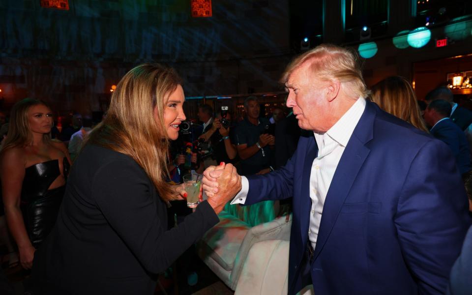 Donald Trump with Caitlyn Jenner last year