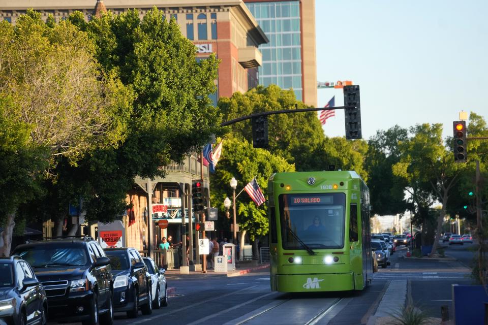 Development along Mill Avenue in Tempe includes the Valley's lightrail system. Photographed on July 8, 2023.