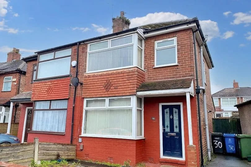 This semi-detached house is going to auction for a bargain price in May -Credit:Auction House Manchester
