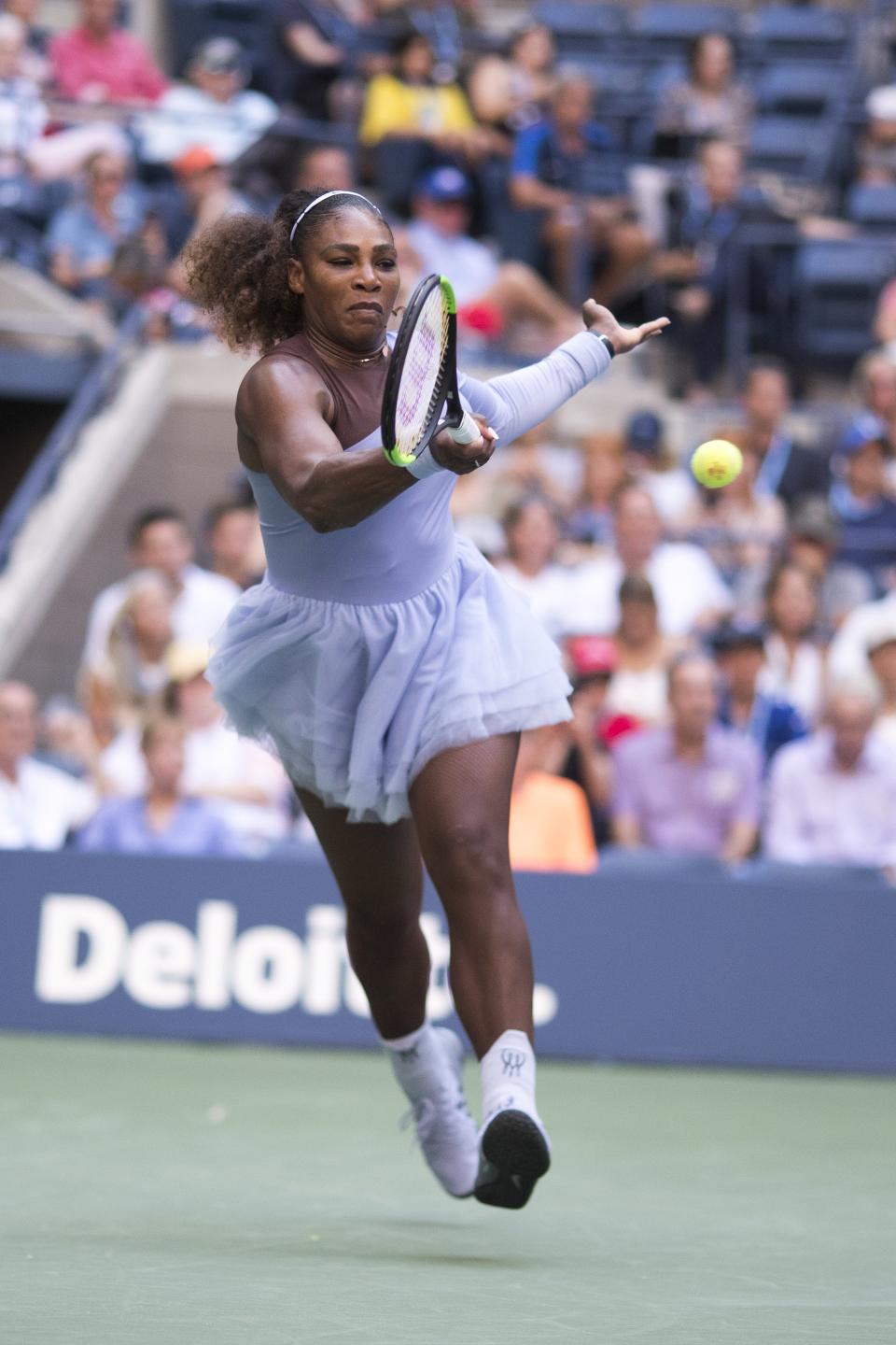 Tutu on the tennis court.