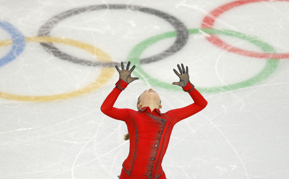 Julia Lipnitskaia of Russia competes in the women's team free skate figure skating competition at the Iceberg Skating Palace during the 2014 Winter Olympics, Sunday, Feb. 9, 2014, in Sochi, Russia. (AP Photo/Vadim Ghirda)