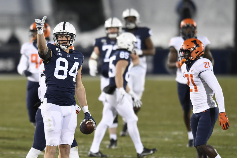 Penn State tight end Theo Johnson (84) celebrates a first down catch during the first quarter of an NCAA college football game in State College, Pa., on Saturday, Dec. 19, 2020. (AP Photo/Barry Reeger)