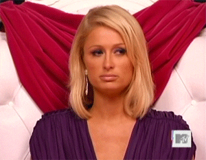 Paris Hilton shakes her head in disapproval