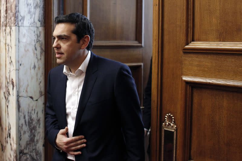 Greek Prime Minister Alexis Tsipras arrives for a parliament session of Syriza party lawmakers at the Greek Parliament in Athens February 5, 2015. REUTERS/Kostas Tsironis