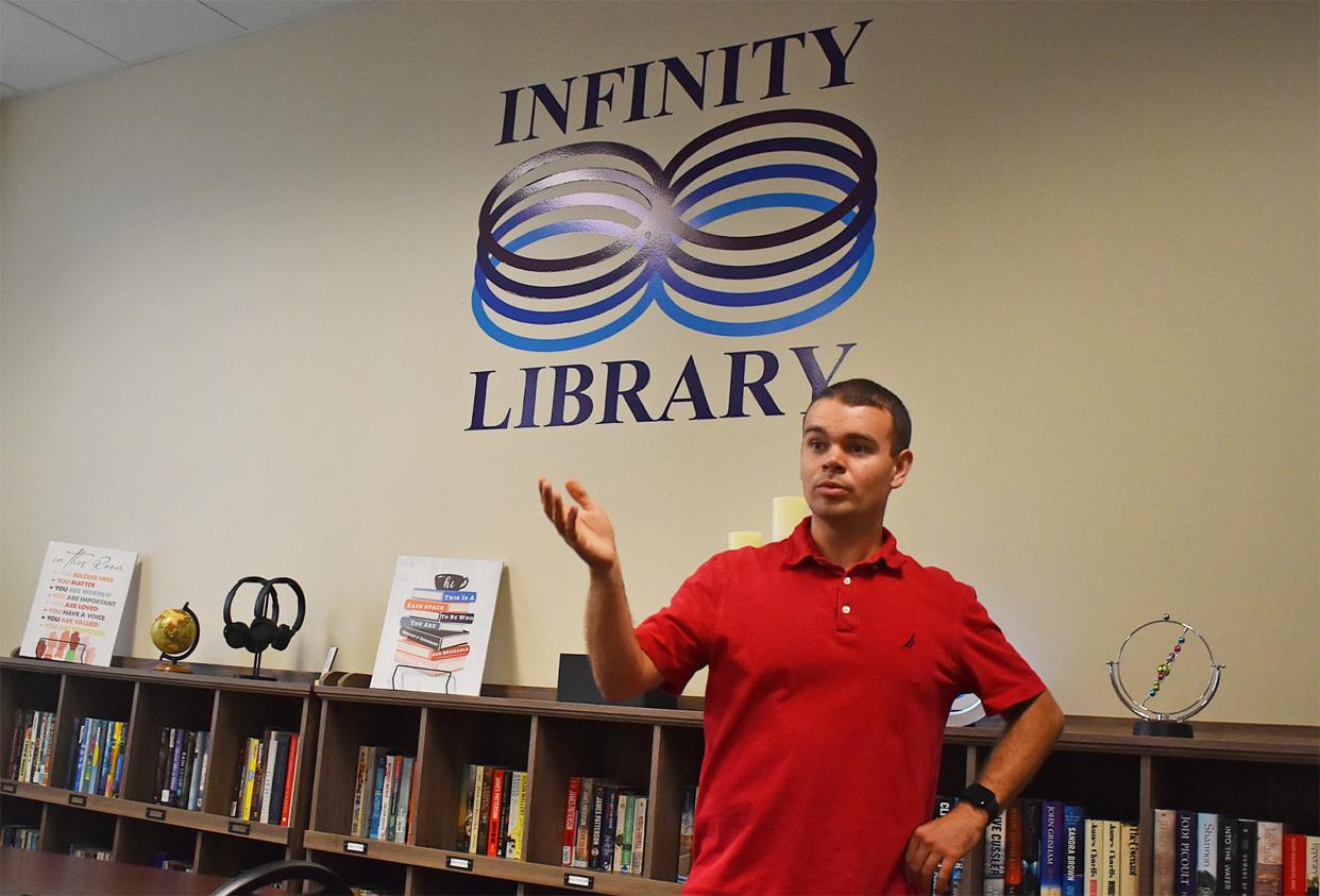 Sam Freitas talks about his concept for the Infinity Library at People, Incorporated on Thursday, Aug. 8, 2024. The library is designed by and for neurodiverse people.