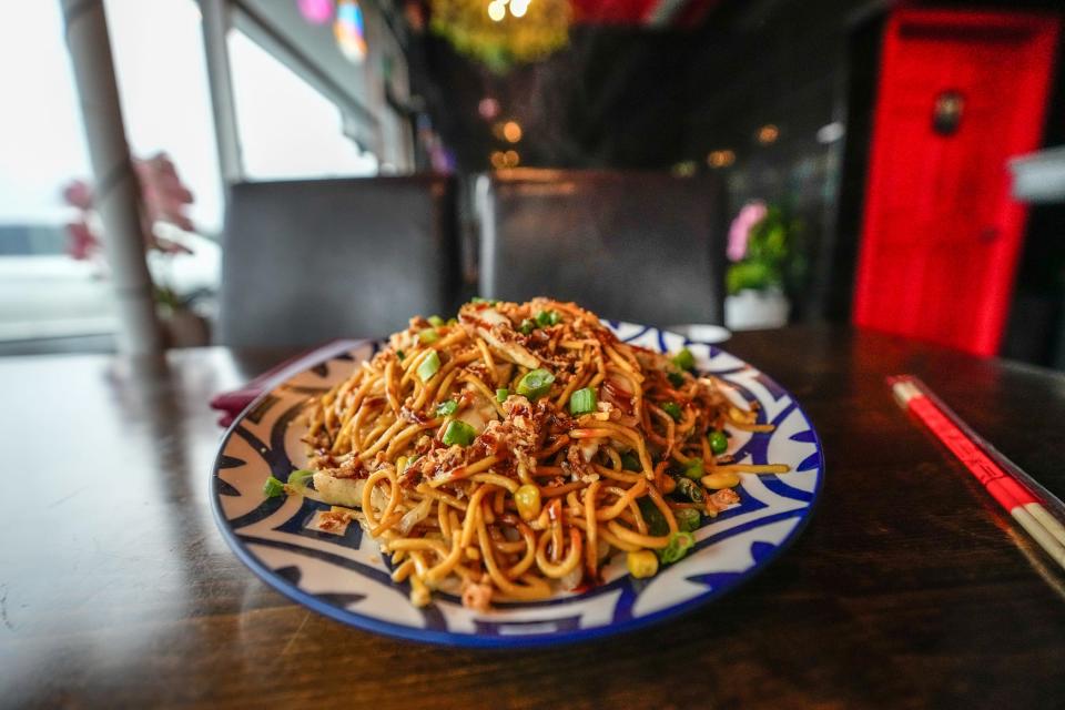 Pan Tay Khow Suey is noodles with chicken, cabbage, cauliflower, tomato, scallion and five spices at Nanu Burmese Fusion.